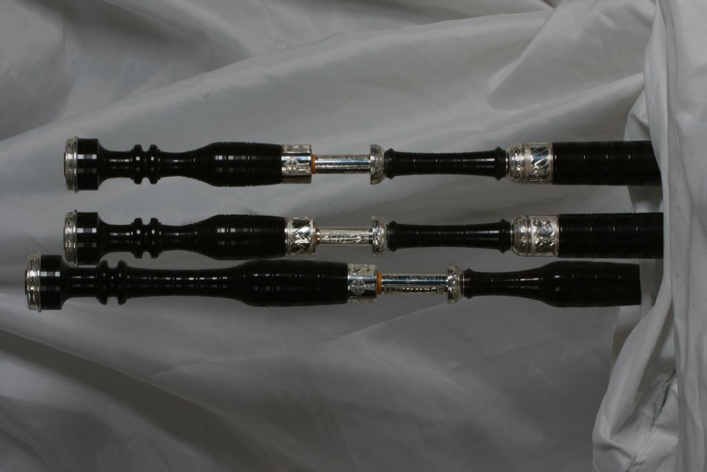 Blackwood original, with custom engraved sterling silver ferrules, tuning pins and button mounts.